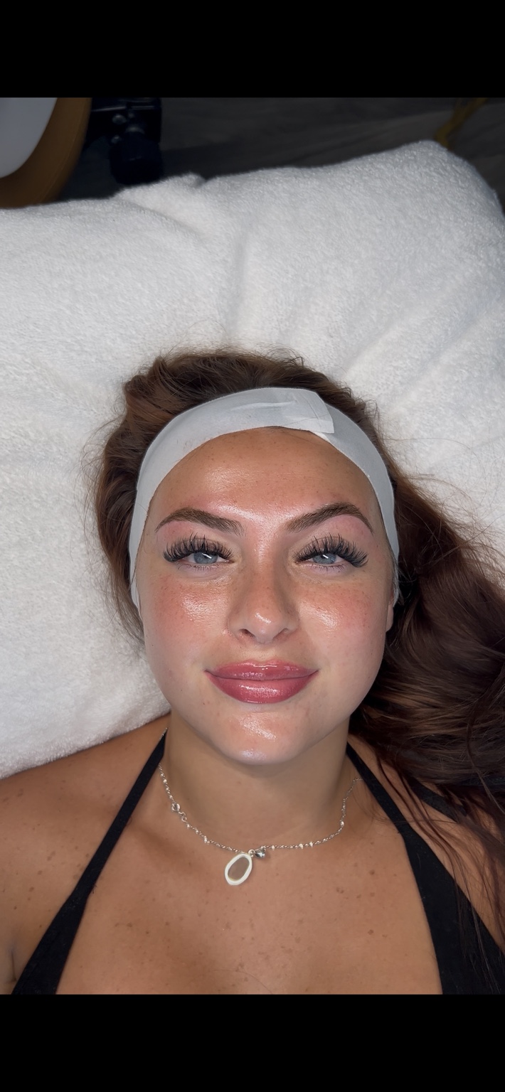 Client glowing after a facial